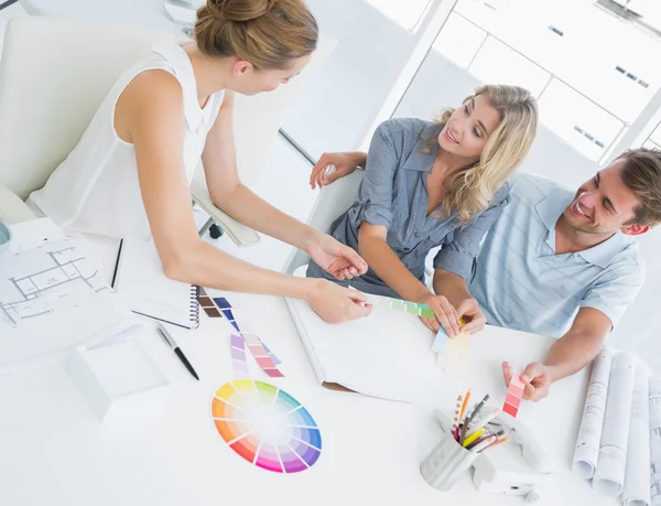 Group of artists working on designs — Stock Photo, Image