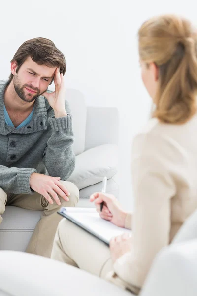 Man in meeting with a financial adviser — Stock Photo, Image