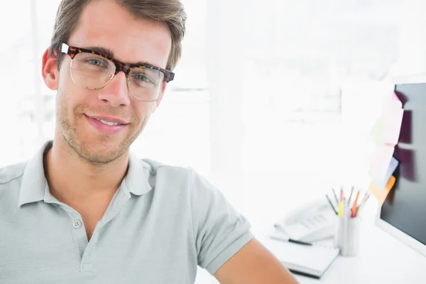 Portrait of a casual male photo editor smiling — Stock Photo, Image