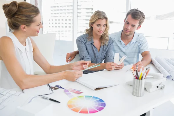 Group of artists working on designs — Stock Photo, Image