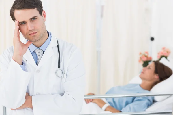 Worried doctor with patient in hospital — Stock Photo, Image