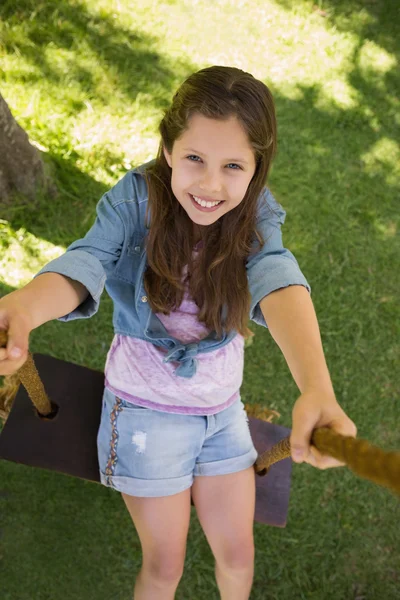 Cute little young girl on swing — Stock Photo, Image