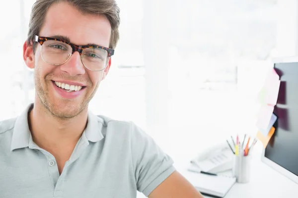 Portrait of a casual male photo editor smiling — Stock Photo, Image