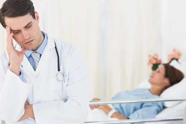 Worried doctor with patient in hospital — Stock Photo, Image