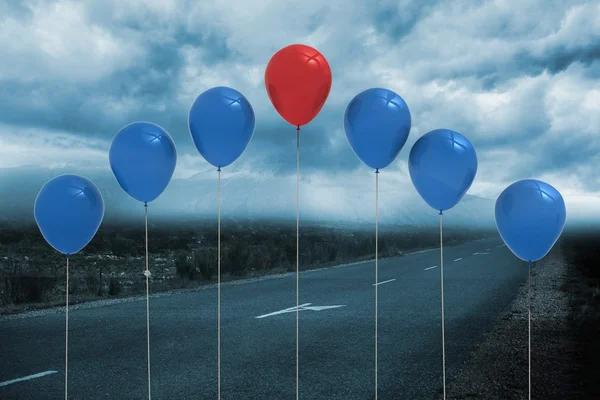 Balloons above a road — Stock Photo, Image