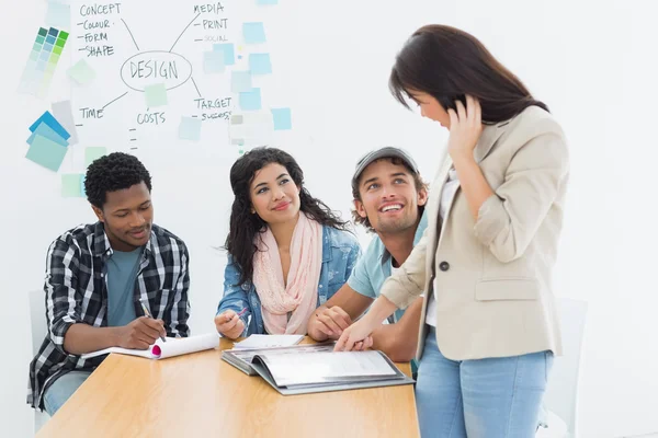 Artists working at desk in creative office — Stock Photo, Image