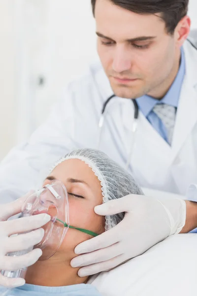 Female patient receiving artificial ventilation — Stock Photo, Image