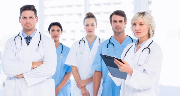 Portrait of serious confident group of doctors — Stock Photo, Image