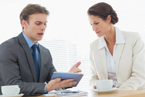 Smartly dressed couple in a business meeting — Stock Photo, Image