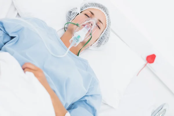 Female patient receiving artificial ventilation — Stock Photo, Image