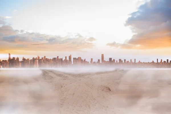 Sandy path leading to large urban city — Stock Photo, Image