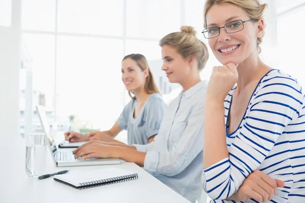 Three young people working in office — Stock Photo, Image