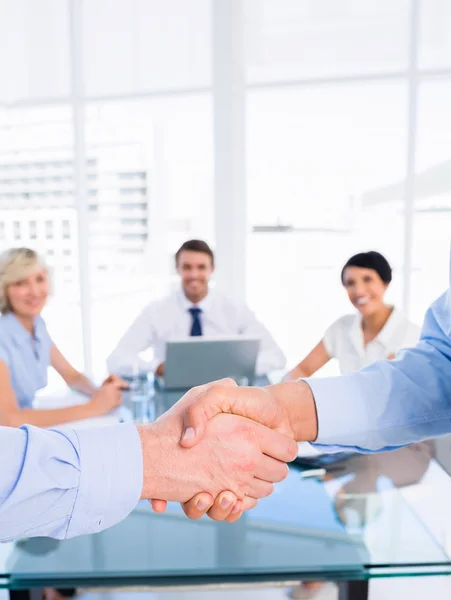 Close-up of a handshake in business meeting — Stock Photo, Image