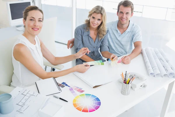 Group of artists working on designs Stock Photo