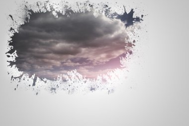 Splash on wall revealing cloudy sky clipart