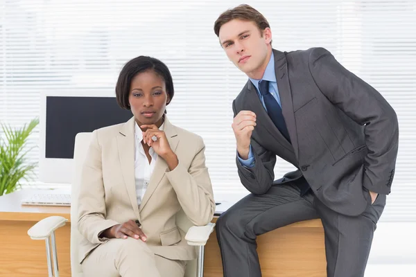 Business colleagues sitting in office — Stock Photo, Image