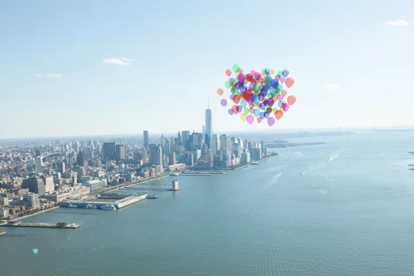 Many colourful balloons above coast — Stock Photo, Image