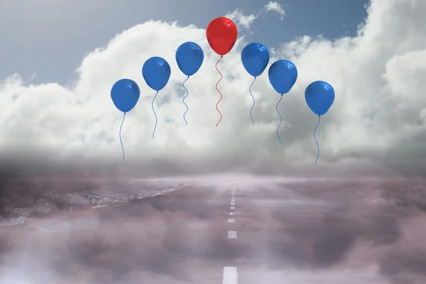 Balloons above a road — Stock Photo, Image