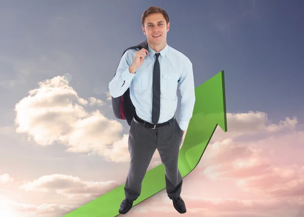 Composite image of smiling businessman holding his jacket — Stock Photo, Image