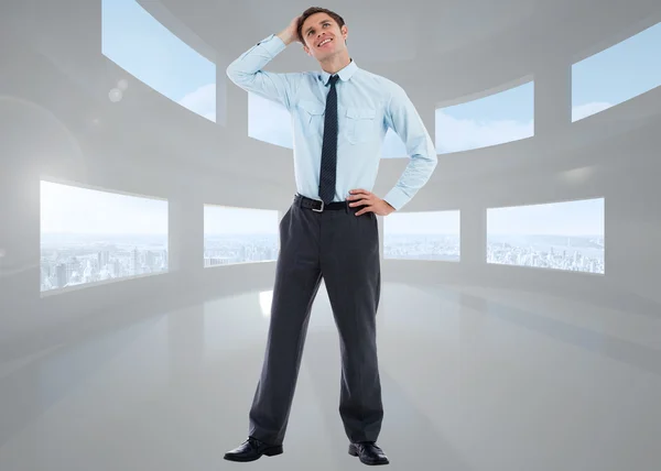 Composite image of thoughtful businessman with hand on head — Stock Photo, Image