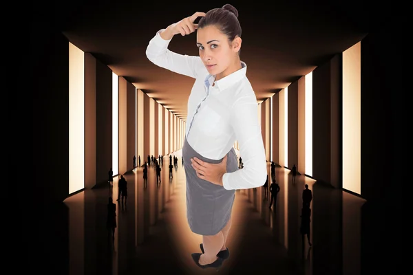 Composite image of focused businesswoman — Stock Photo, Image