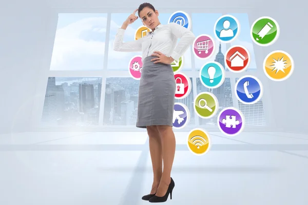 Composite image of focused businesswoman — Stock Photo, Image