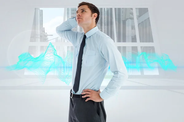 Composite image of thinking businessman with hand on head — Stock Photo, Image