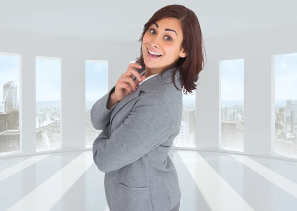 Imagem composta de mulher de negócios pensativa sorridente — Fotografia de Stock