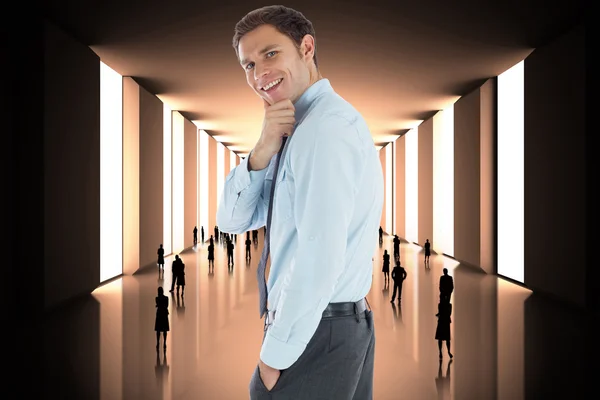 Composite image of thoughtful businessman with hand on chin — Stock Photo, Image