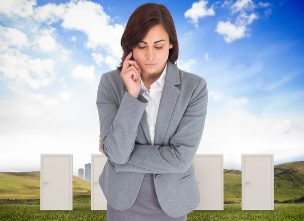 Composite image of focused businesswoman — Stock Photo, Image