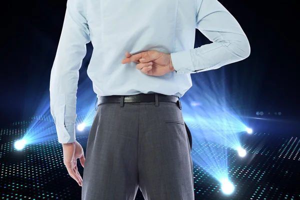 Image composite d'un homme d'affaires croisant les doigts derrière son dos — Photo