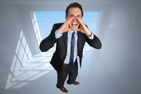 Composite image of shouting businessman — Stock Photo, Image