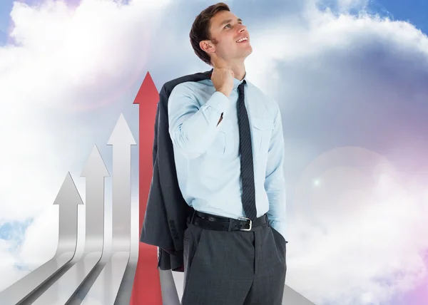 Composite image of smiling businessman holding his jacket — Stock Photo, Image