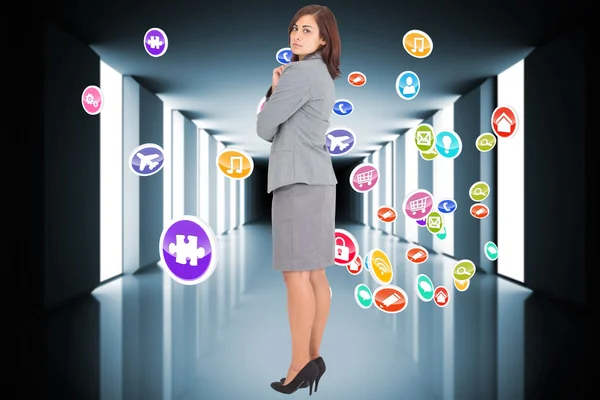 Composite image of focused businesswoman — Stock Photo, Image