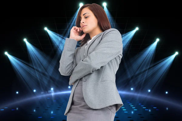 Composite image of focused businesswoman — Stock Photo, Image