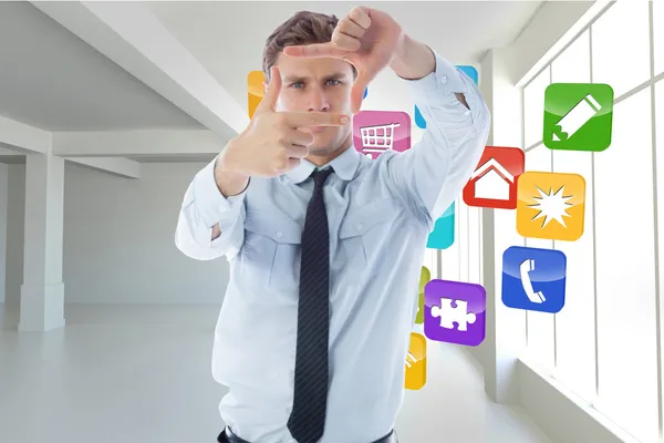 Composite image of businessman making frame with hands — Stock Photo, Image