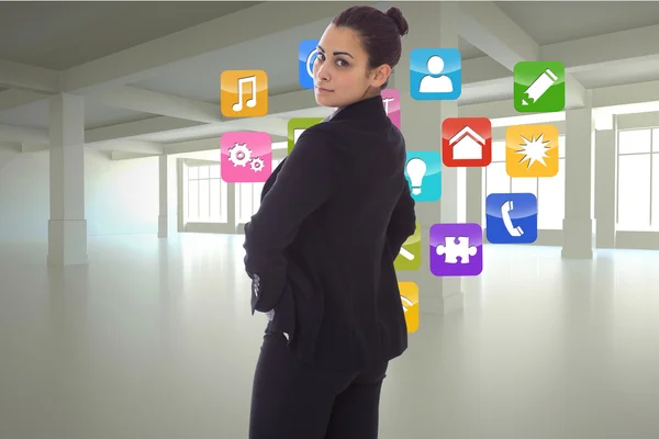 Composite image of serious businesswoman — Stock Photo, Image