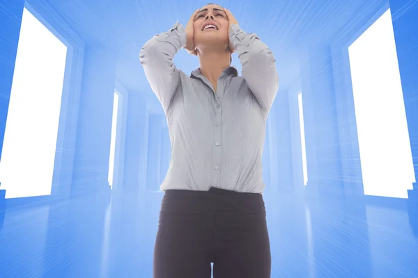 Composite image of desperate businesswoman — Stock Photo, Image