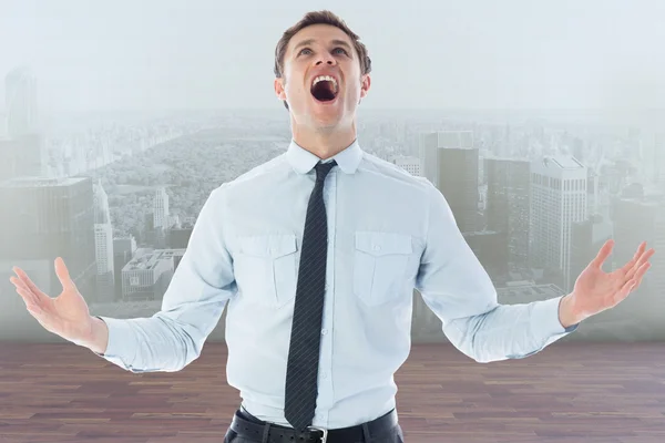 Composite image of shouting businessman — Stock Photo, Image