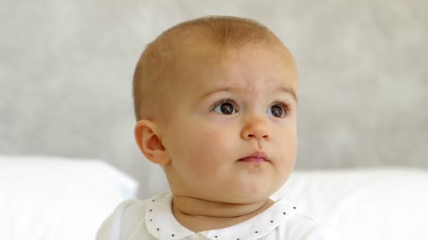 Cute baby on bed — Stock Video