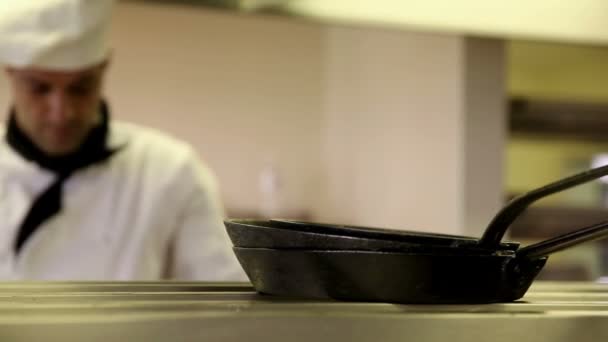 Handsome chef wiping down the counter — Stock Video