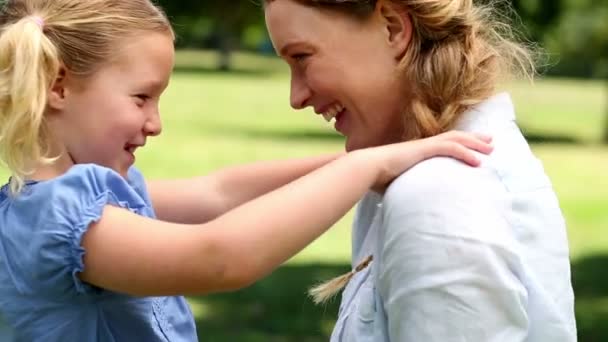 Happy mother with her little girl in the park — Stock Video