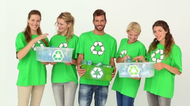 Team of environmental activists holding boxes — Stock Video