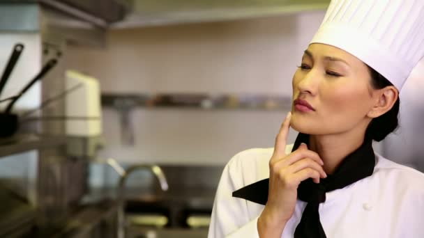 Thoughtful chef smiling at camera — Stock Video