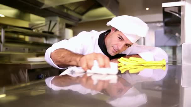 Handsome chef wiping down the counter — Stock Video