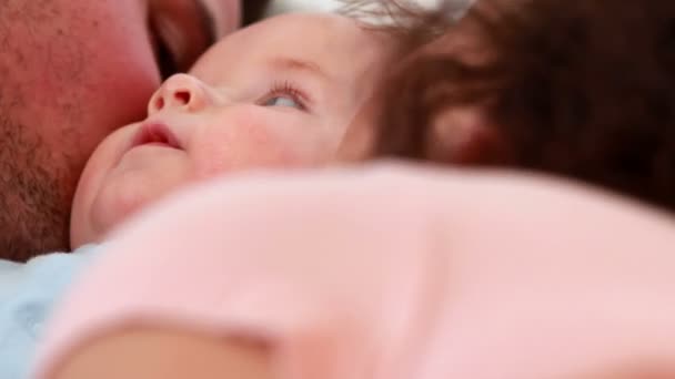 Baby Boy Blue Babygro Being Kissed Happy Parents Bed Home — Stock Video