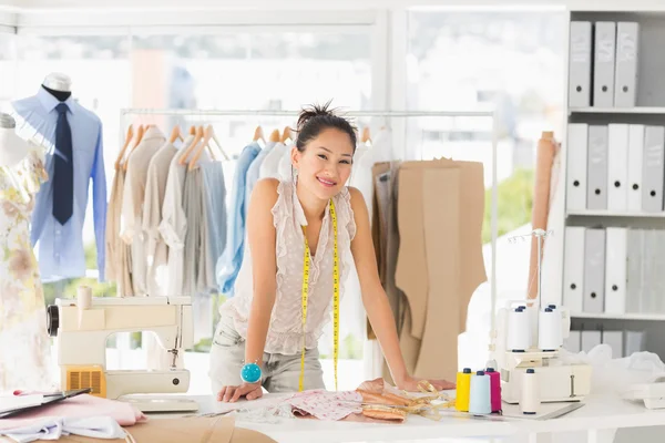 Fashion designer working on dress — Stock Photo, Image