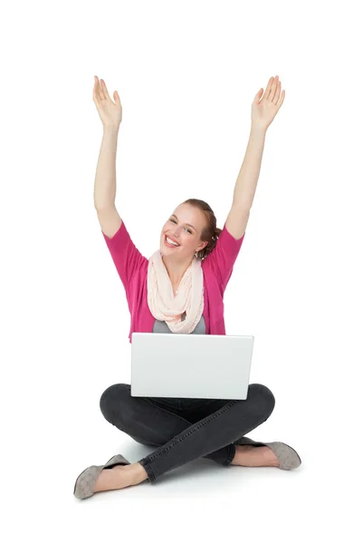 Woman with laptop raising hands — Stock Photo, Image