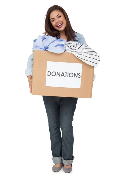 Woman with clothes donation — Stock Photo, Image