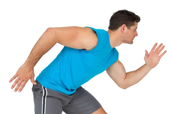 Side view of a young sporty man running — Stock Photo, Image